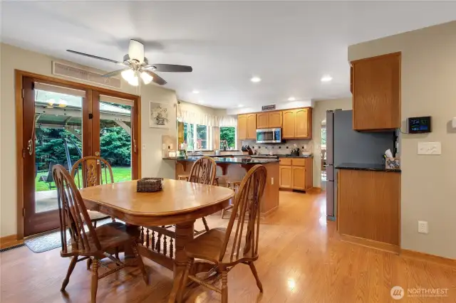Eating area conveniently located off the kitchen, offering a comfortable space for casual meals.