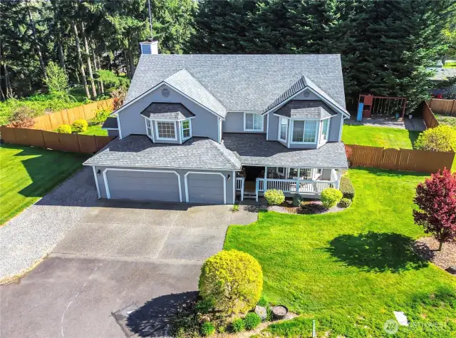 Spacious front yard offering great curb appeal and room to enjoy the outdoors.