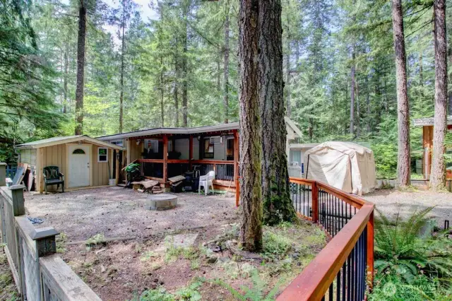 Fenced lot with shed and trailer