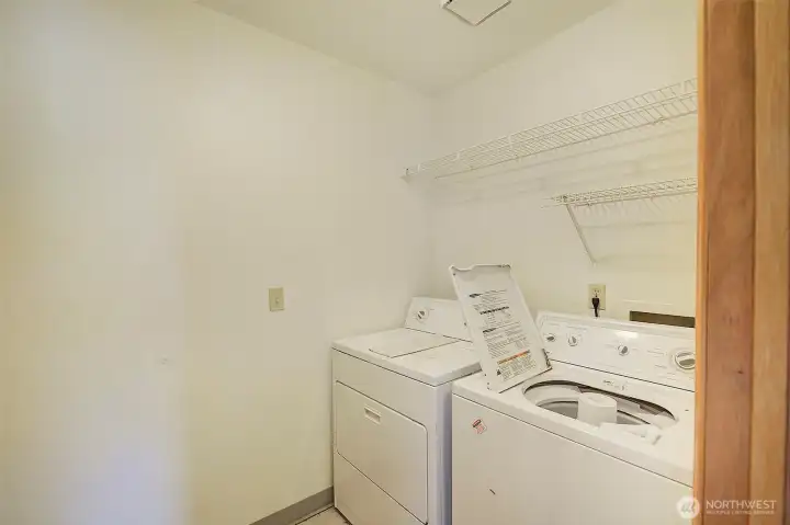 Main laundry with entry to garage