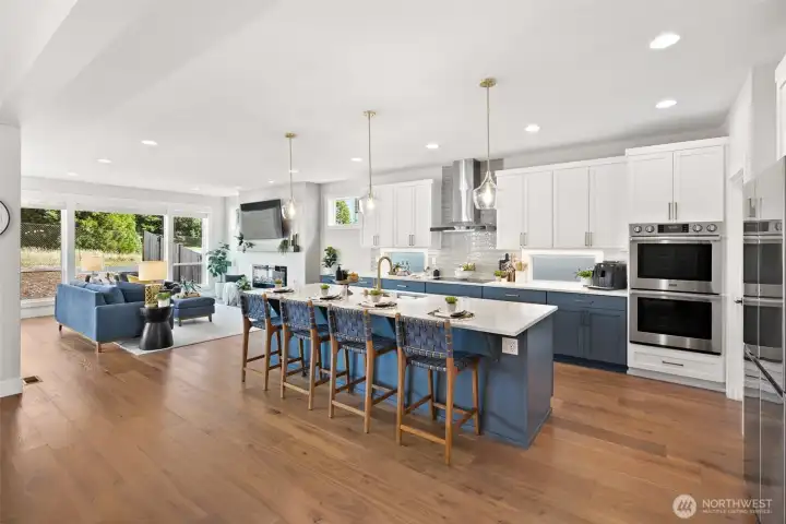Open concept dining, kitchen and living room.