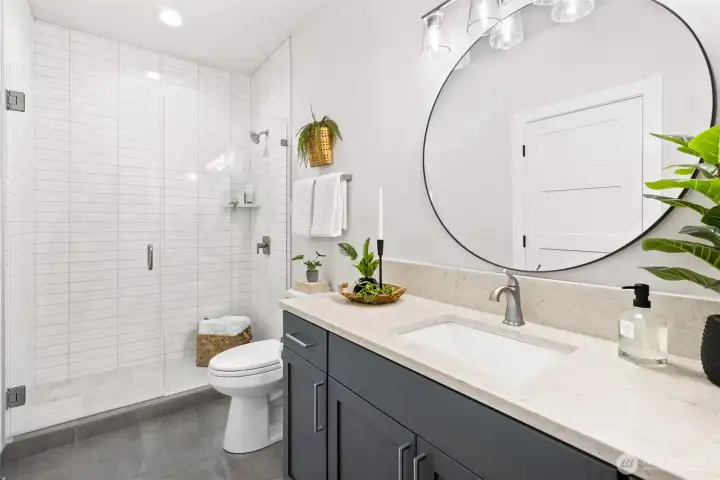 3/4 bathroom downstairs right next to bedroom on the main level.