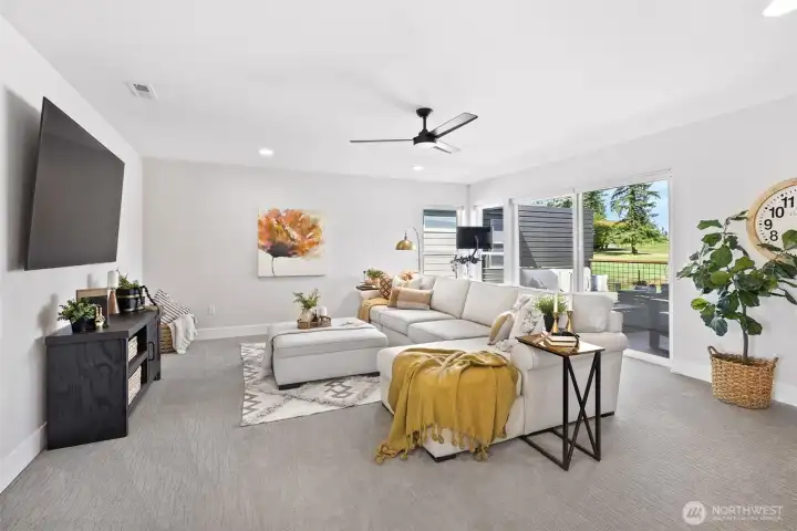Massive bonus room upstairs perfect for movie nights.
