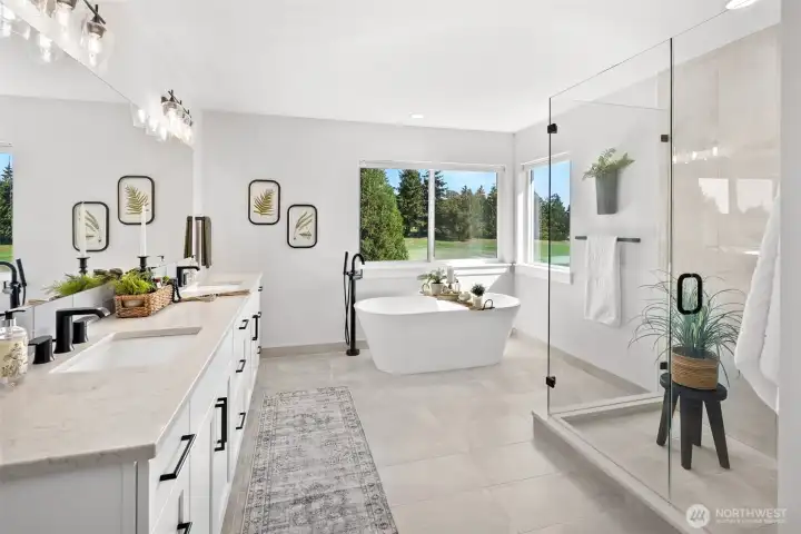 5 piece bathroom in the primary suite overlooking the golf course.