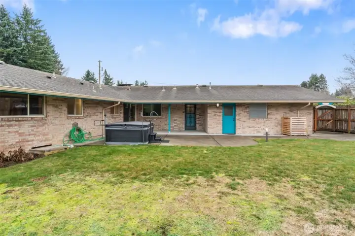 Great fully fenced backyard, ready for your dining set, firepit and friends! Hot tub is a great feature!