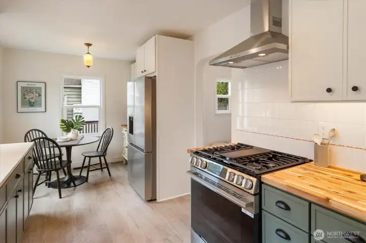 Gas range & stainless steel appliances.