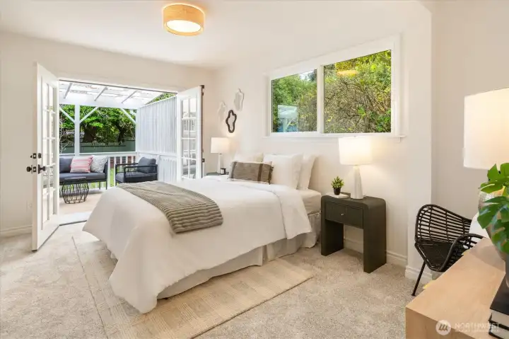Beautiful french doors open to the expansive back patio and yard.