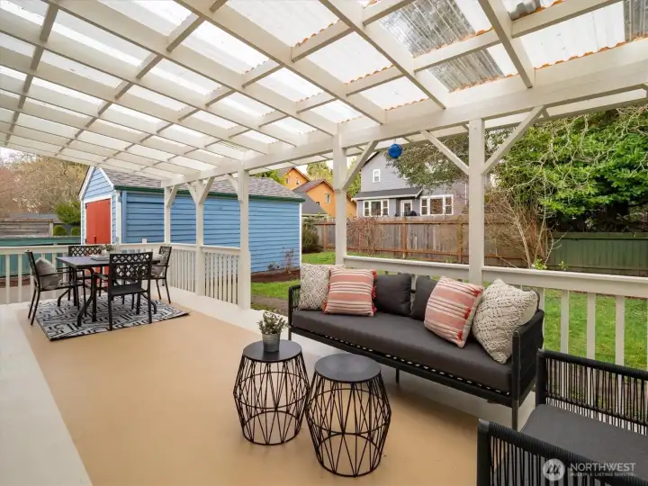Expansive back patio, covered for use in all seasons.