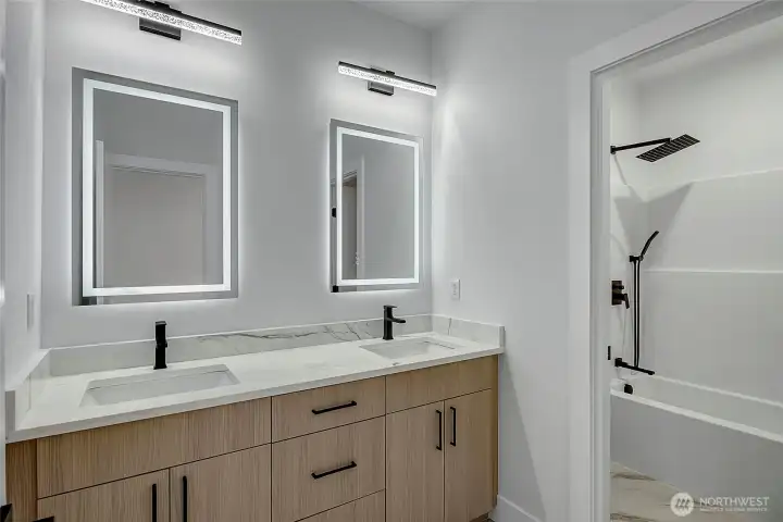 Double sink with separated shower and tub (photo of similar home in separate community)