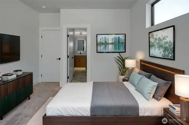 En suite bathroom in bedroom (virtually staged, photo of similar home in separate community)