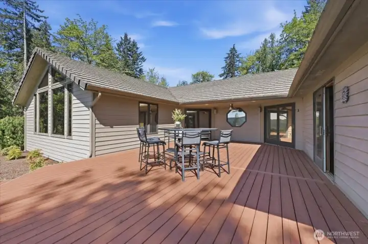 Brand New Deck ~ Sliders Open to the deck just off of the Living room, the spare bedrooms & of course the Primary Retreat.   note there is Hook up for Spa/Hot tub just off the deck.