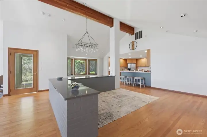Casual Space off of the kitchen as well as a dedicated Dining Room beyond the pony wall.