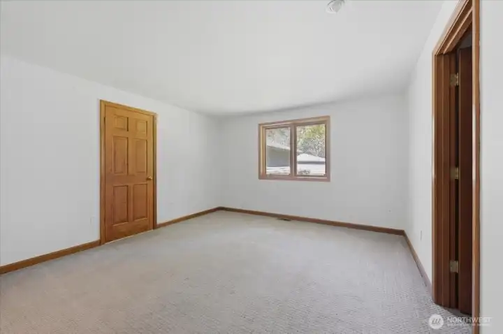 Spare Bedroom w Walk-in Closet & door into the Full Bathroom.