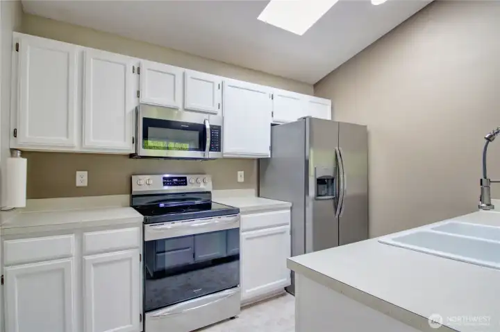 New appliances and a skylight over the kitchen to keep things bright.