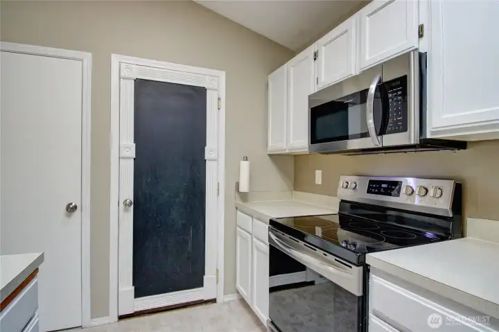 The garage out to the garage is on the right and the deep pantry is on the left.