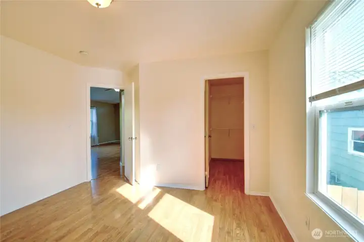 The east guest bedroom has a large walk-in closet.