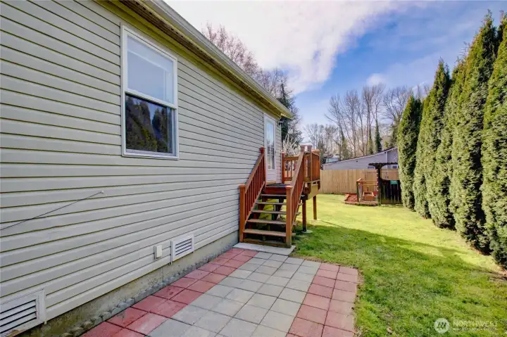 There is a nice patio between the two decks.