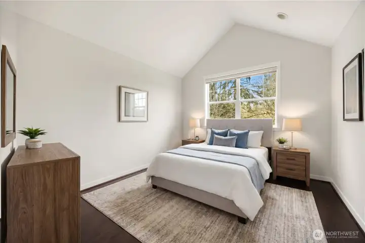 The upper-level primary ensuite is a true retreat, with vaulted ceilings.