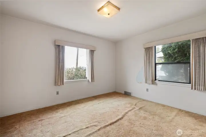 Rear main floor bedroom with amazing views of the sound