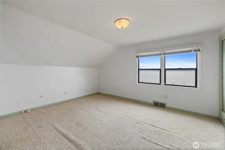 Upstairs has a bedroom with a HUGE walk in closet