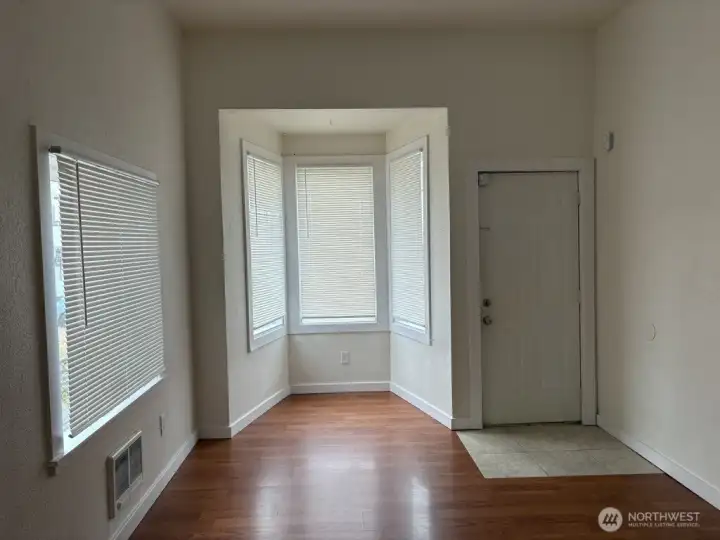 Living room with character! Bay window, upgraded flooring and tall ceilings. Living room with character! Bay window, upgraded flooring and tall ceilings.