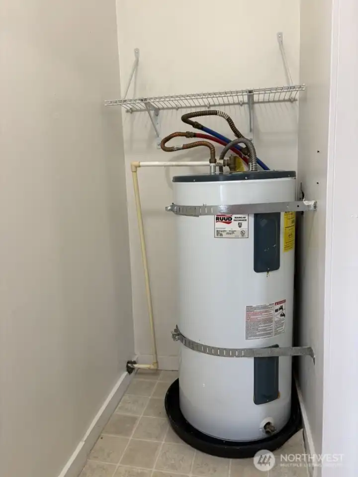 Water heater in the utility room Water heater in the utility room