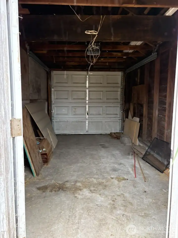 Garage is off the back alley Garage is off the back alley