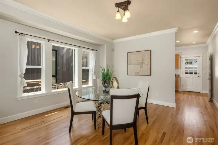 The dining room flows naturally from the kitchen - ideal for everyday meals and easy entertaining.
