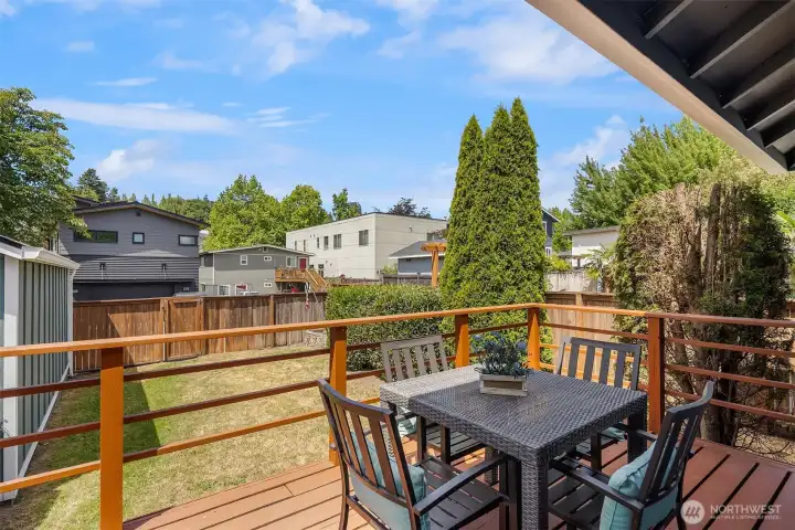 The back deck is accessed from the kitchen and is perfect for outdoor dining and entertaining.