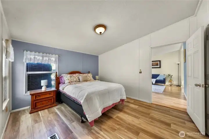 Primary bedroom with attached ensuite bathroom for added privacy and convenience