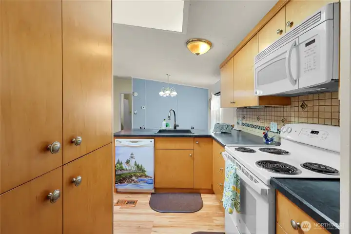 view into the kitchen from the laundry room