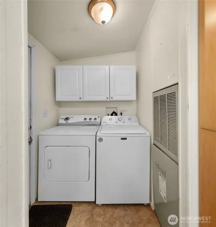 Laundry room and additional entry from the back of the home.