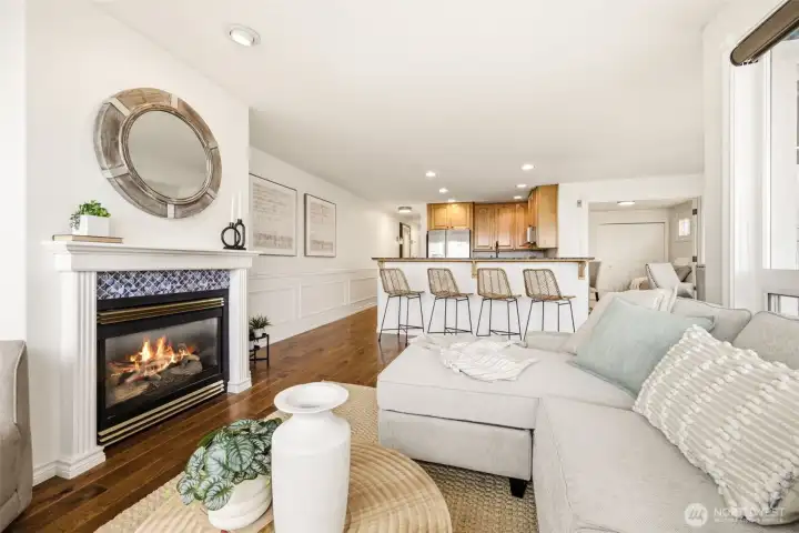 Gas fireplace adds to the ambiance of elegant open concept living. Gas fireplace adds to the ambiance of elegant open concept living.