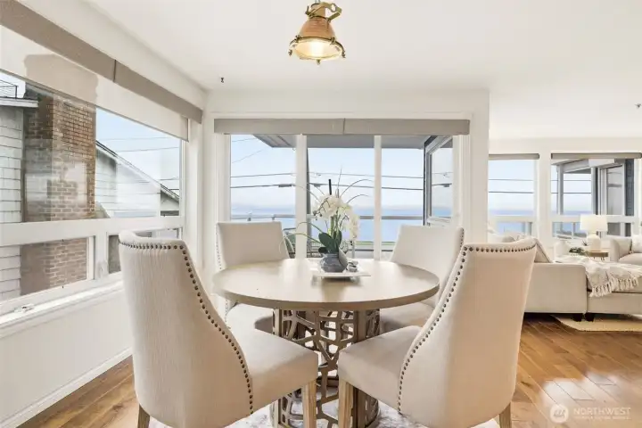 Dining space opens up to the covered deck. Dining space opens up to the covered deck.