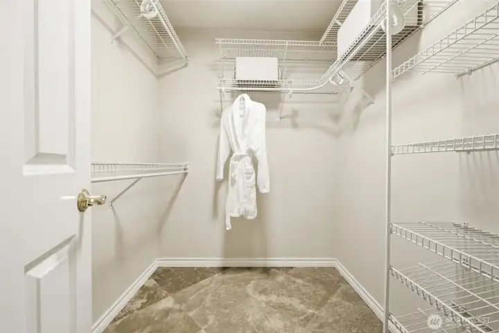 Large walk-in closet in the primary suite. Large walk-in closet in the primary suite.