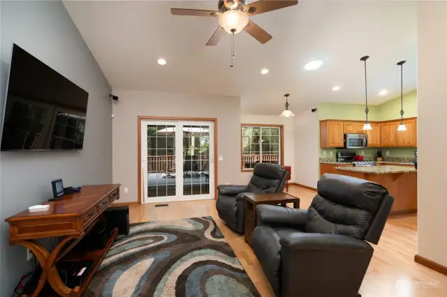 Kitchen/Breakfast Nook/Family Room = Great Room so you never miss any of the action while in the Kitchen. The sliding Door from Family Room takes you out to the fabulous composite Entertainment sized Deck overlooking the beauty of the property.