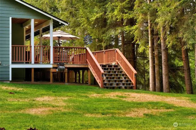 Stairs from the Deck to a fabulous level yard for lawn games and Summer Fun!