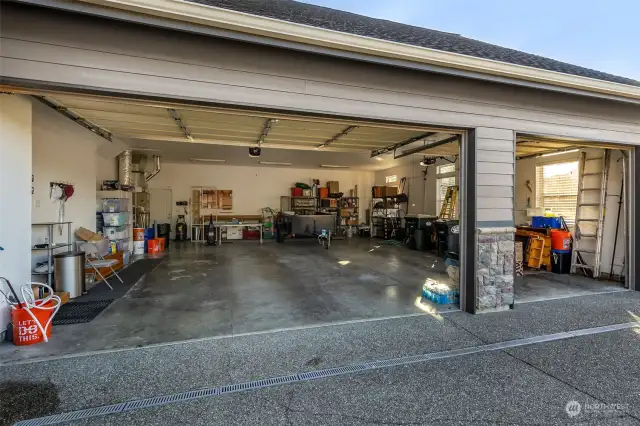 Elevate your storage game with this spacious 3-car garage! Boasting three large windows for plenty of light, a dedicated workbench area for all your projects, and convenient automatic openers, it’s the perfect blend of functionality and style. And those thoughtful drain screens? A genius addition for those extra wet days!