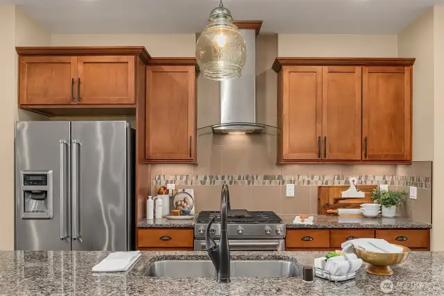 The expansive countertops offer plenty of space to make food prep effortless.