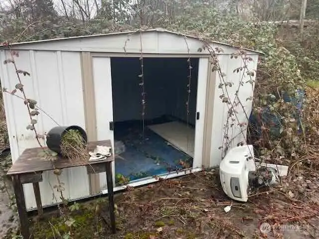 Shed on west side of house