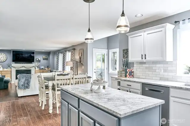 Kitchen looking into eating area and living room