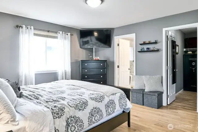 Primary bedroom with walk-in closet