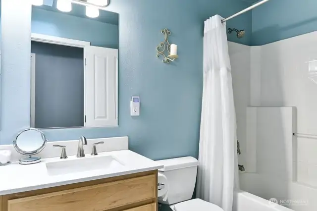 Updated full guest bath with tile floors