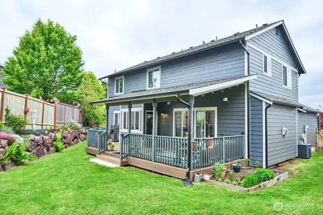 Back yard with raised garden bed