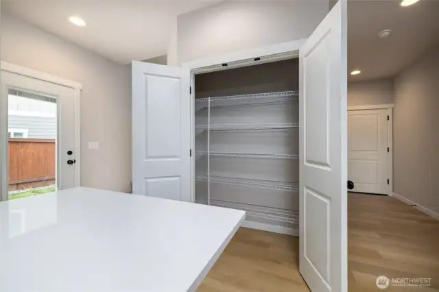 Pantry closet in kitchen.