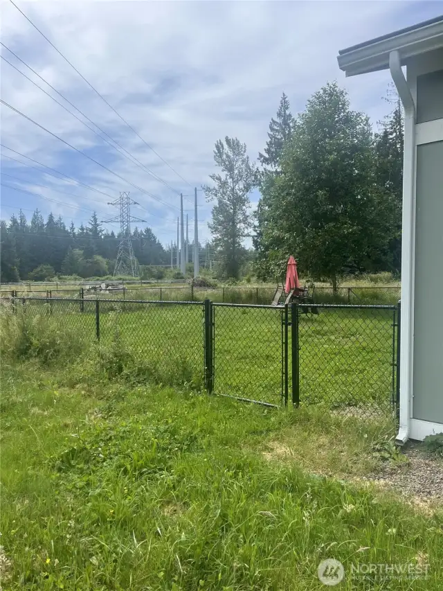 Fenced back of building