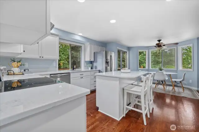 Kitchen with island and eating area.