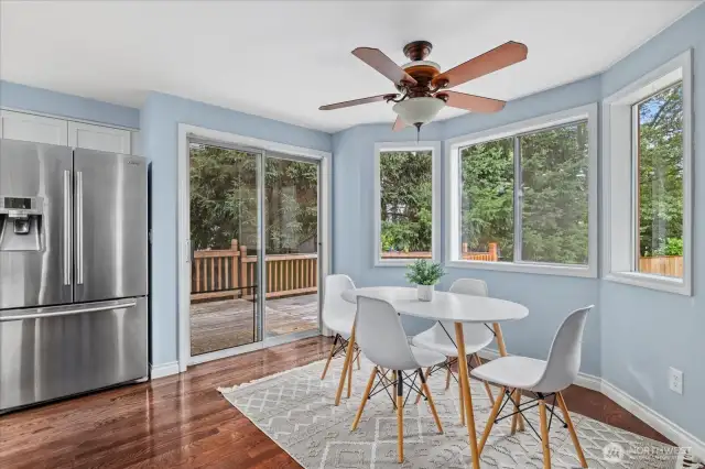 Eating area leads outside to deck and backyard.
