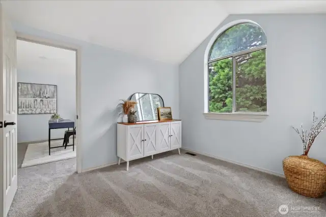 Primary suite with sitting area that also leads to extra flex space/office.