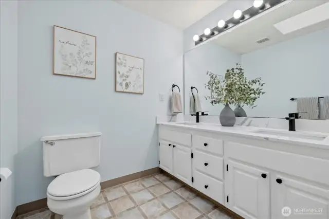 Primary bathroom with new quartz counters.